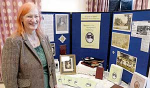 Dr Rowena Edlin-White who gave the Nora Witham Lecture on 8 January 2011, showing her display material at the meeting.