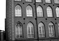 The plaque is sited on the pillar on the far left of this picture, taken to show the building in Beeston where it is sited. Photo: John Beckett.