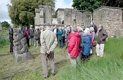 Thoroton members at Old Annesley church with the memorial to George Chaworth-Musters to the left.